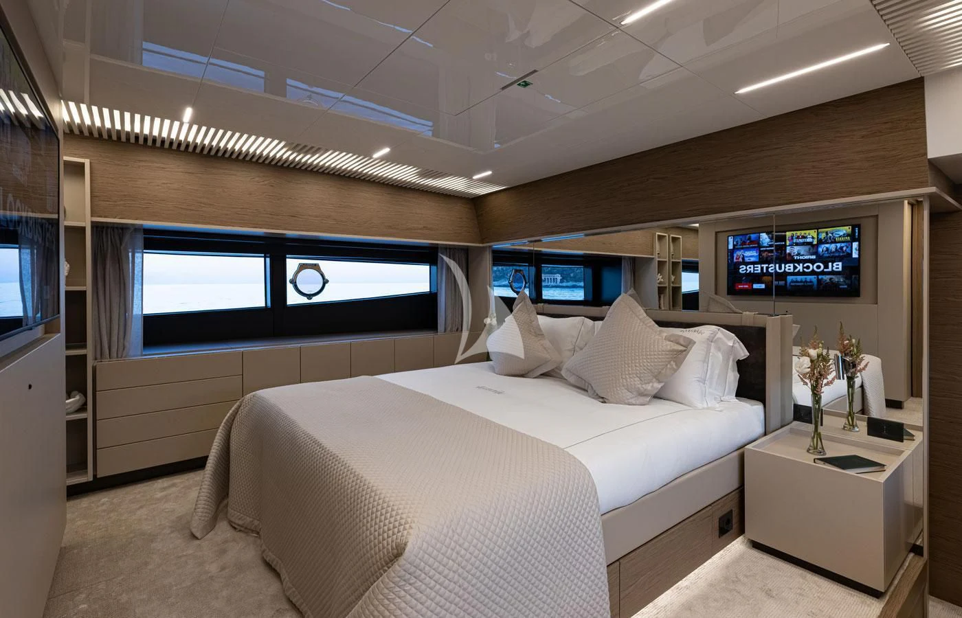a room with a bed and a tv aboard ALEGRIA II Yacht for Sale