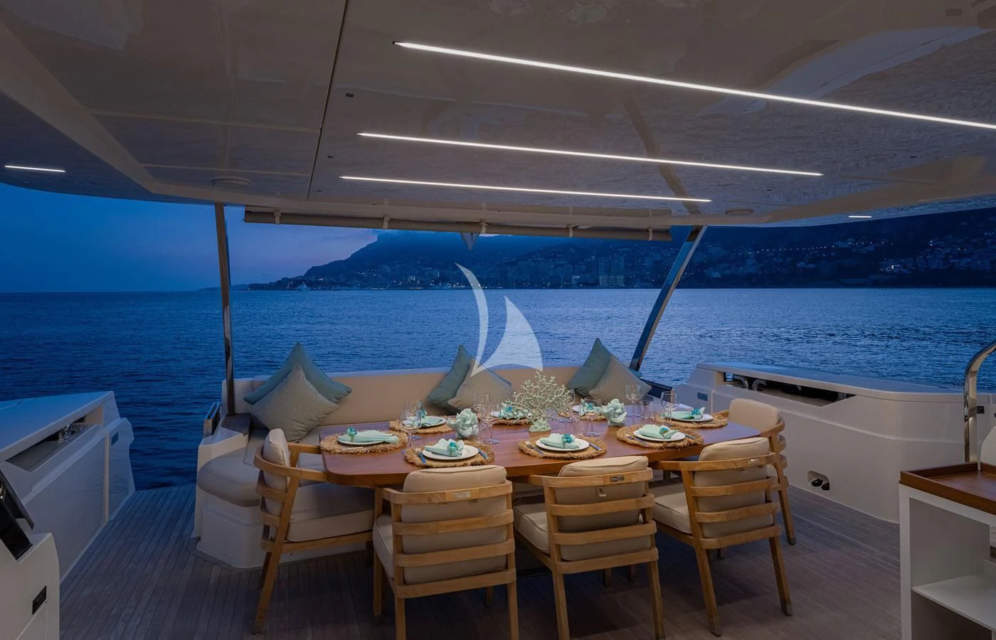 a table set for a meal on a boat aboard ALEGRIA II Yacht for Sale