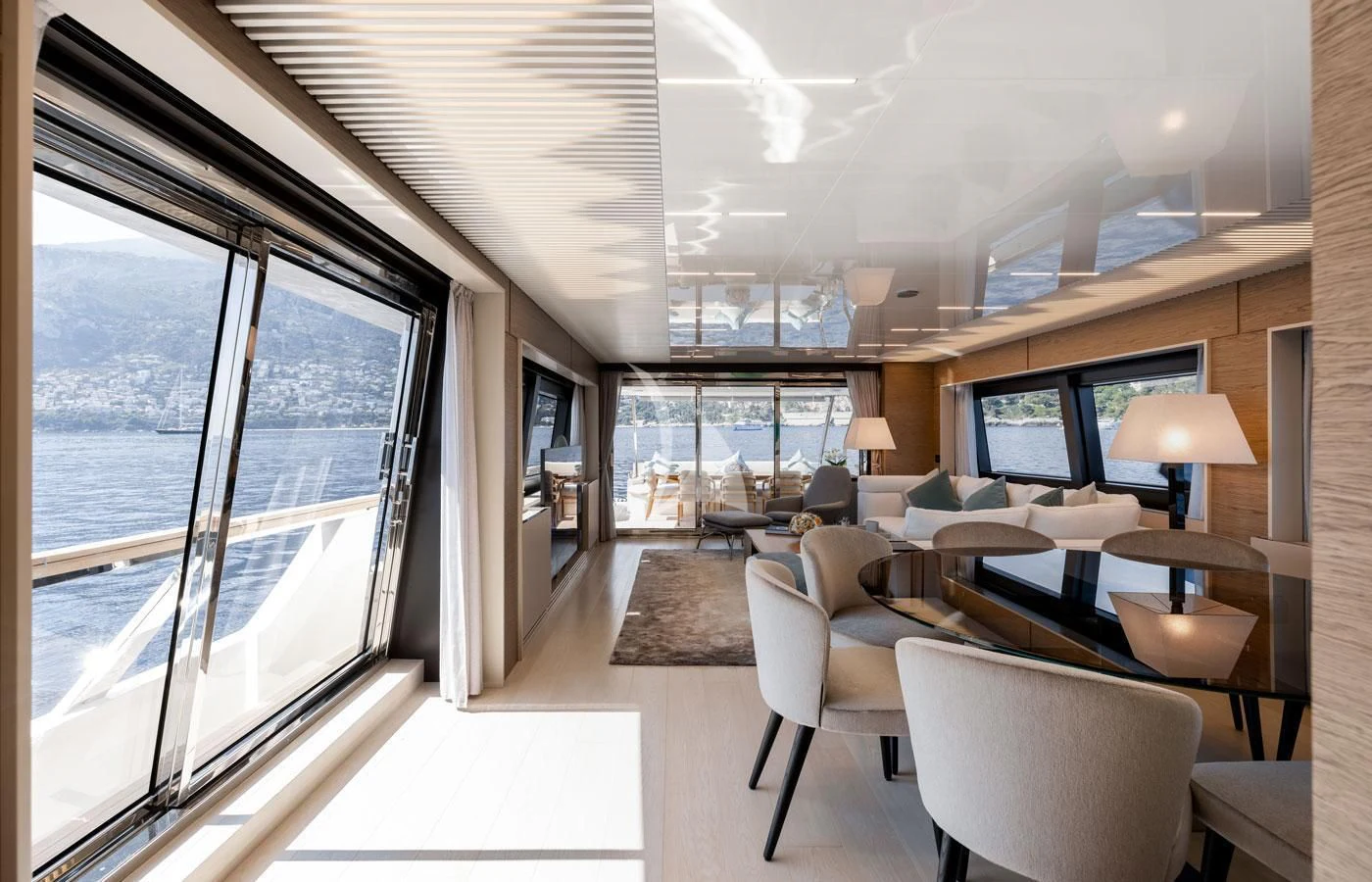 a room with a large window and a view of the city aboard ALEGRIA II Yacht for Sale