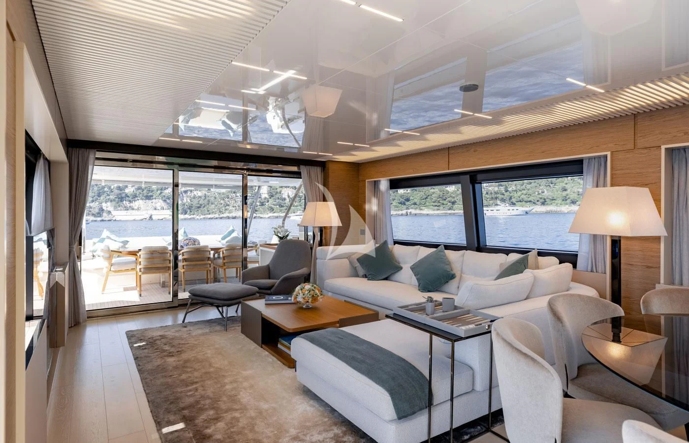 a living room with a large window aboard ALEGRIA II Yacht for Sale