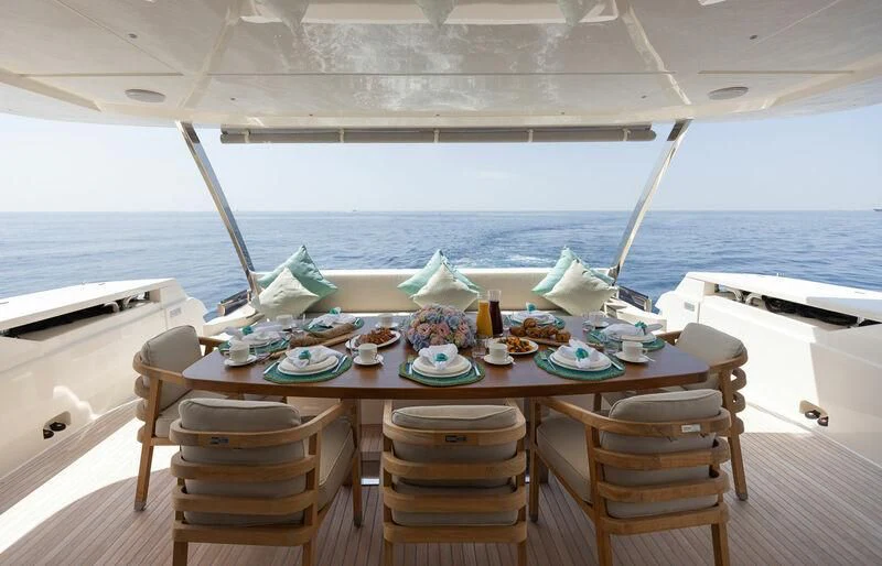 a table on a boat aboard ALEGRIA II Yacht for Sale