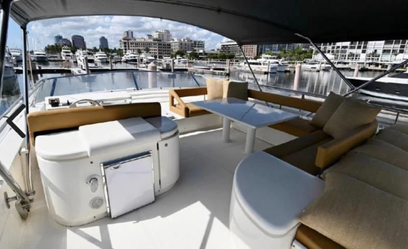 a room with a table and chairs aboard RABBIT Yacht for Sale