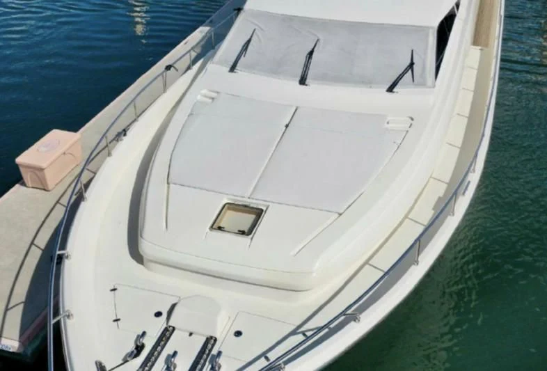 a white boat in the water aboard RABBIT Yacht for Sale
