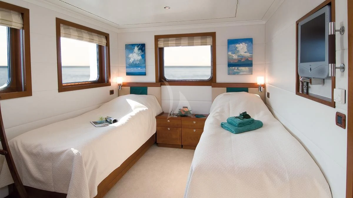 a room with two beds aboard HANSE EXPLORER Yacht for Sale