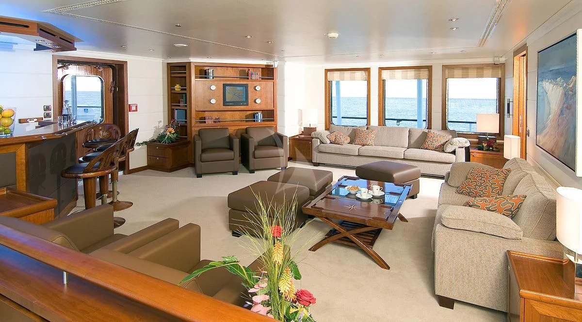 a living room with a large window aboard HANSE EXPLORER Yacht for Sale