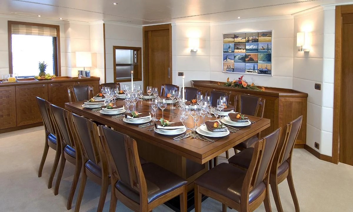 a large kitchen with a dining table aboard HANSE EXPLORER Yacht for Sale