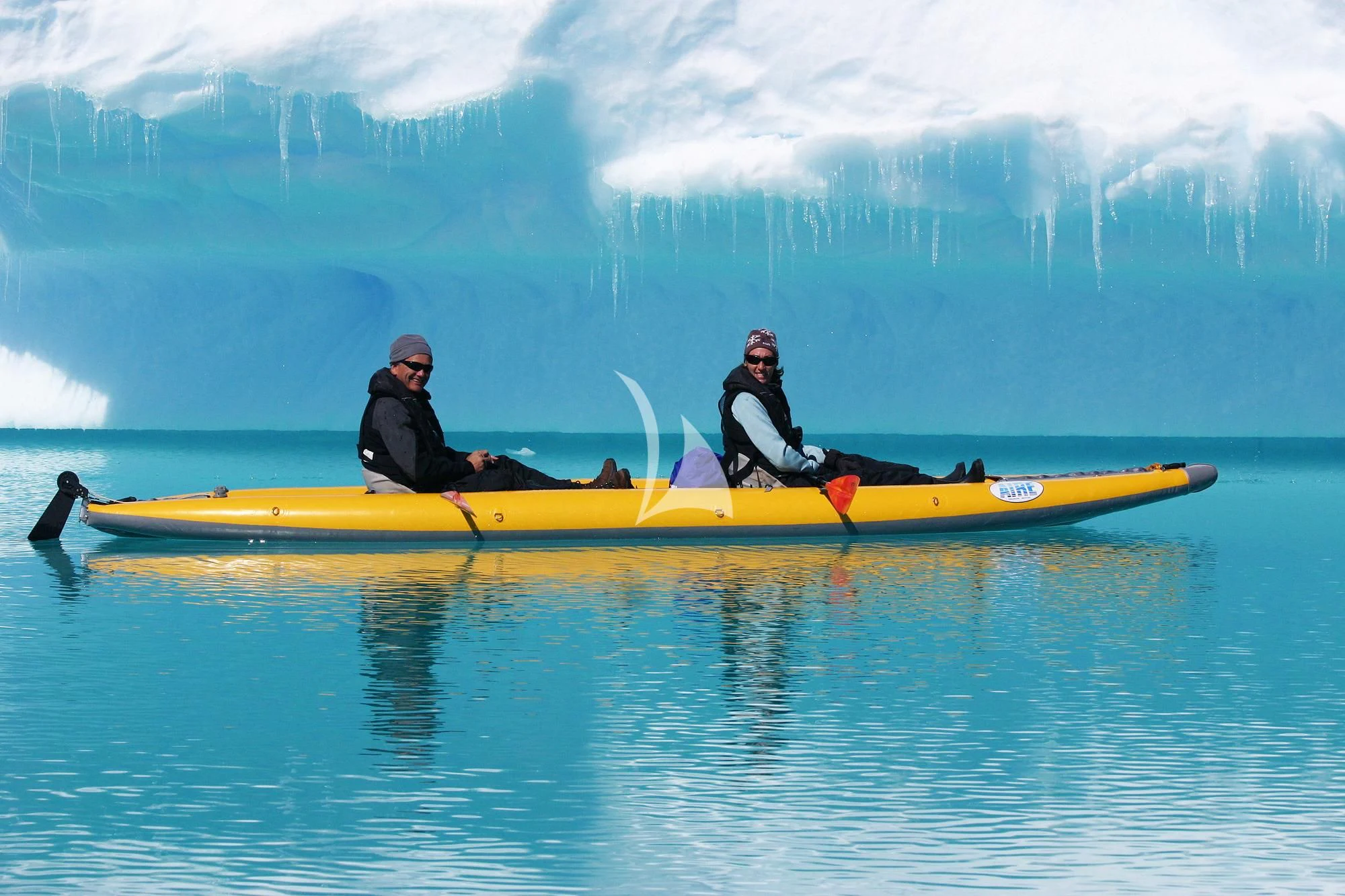 a group of people in a canoe on a lake aboard HANSE EXPLORER Yacht for Sale