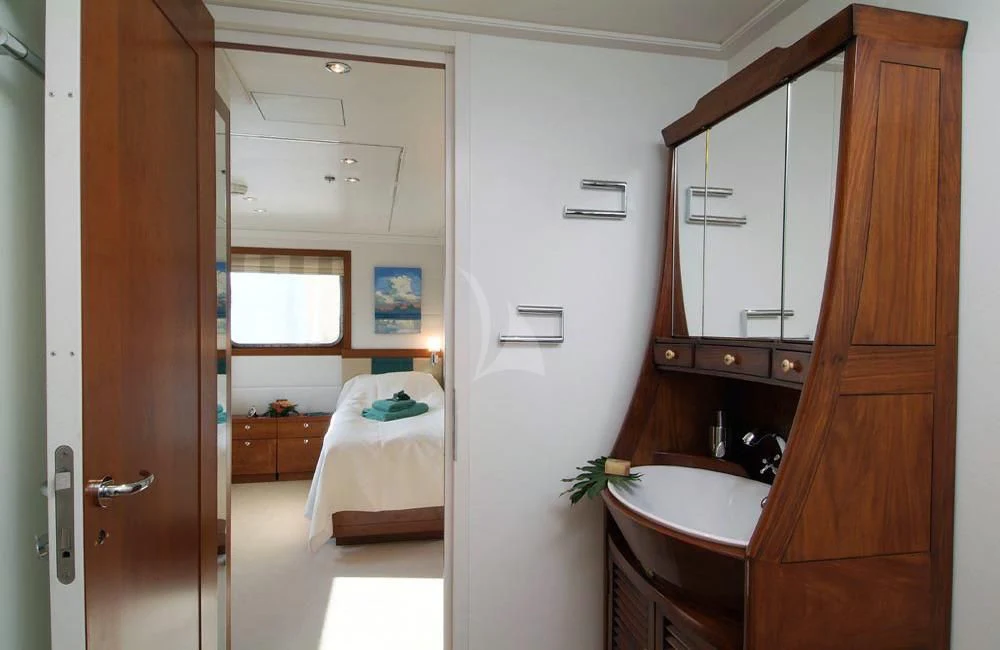 a bathroom with a sink and a mirror aboard HANSE EXPLORER Yacht for Sale