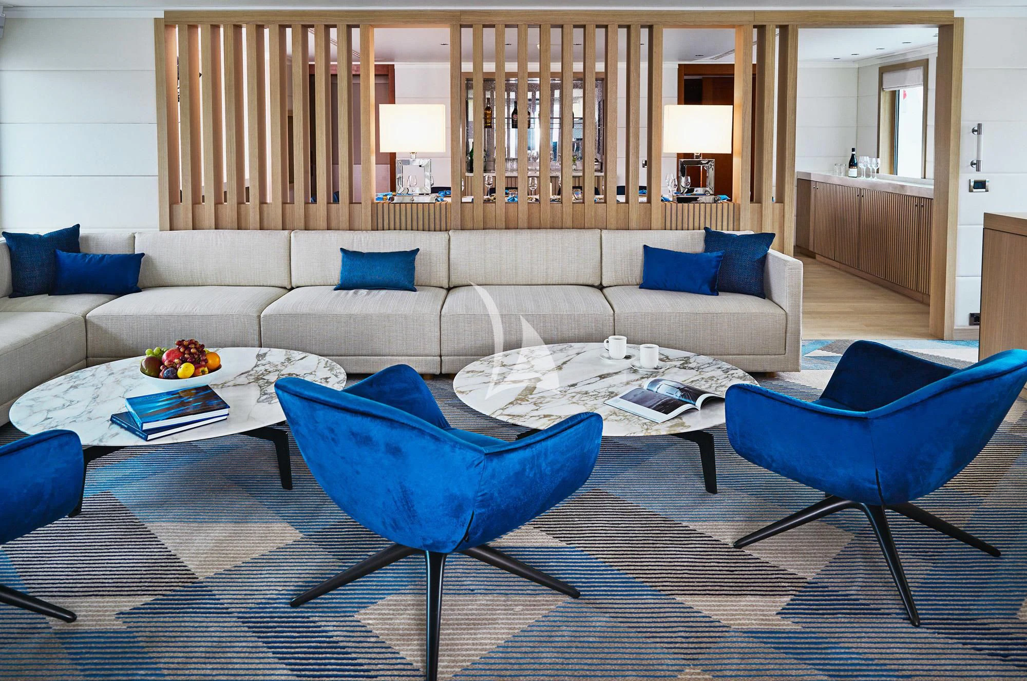 a living room with a couch and a table aboard HANSE EXPLORER Yacht for Sale