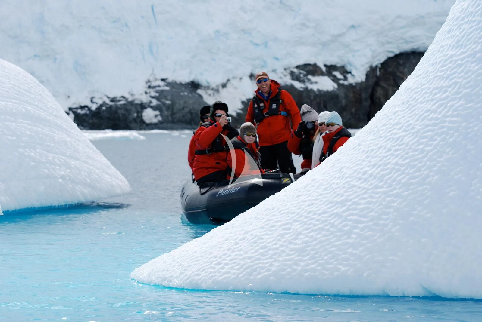 a group of people on a snowmobile in the snow aboard HANSE EXPLORER Yacht for Sale