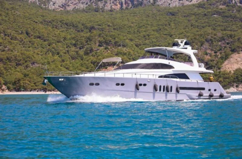 a white yacht on the water aboard ERDOGAN Yacht for Sale