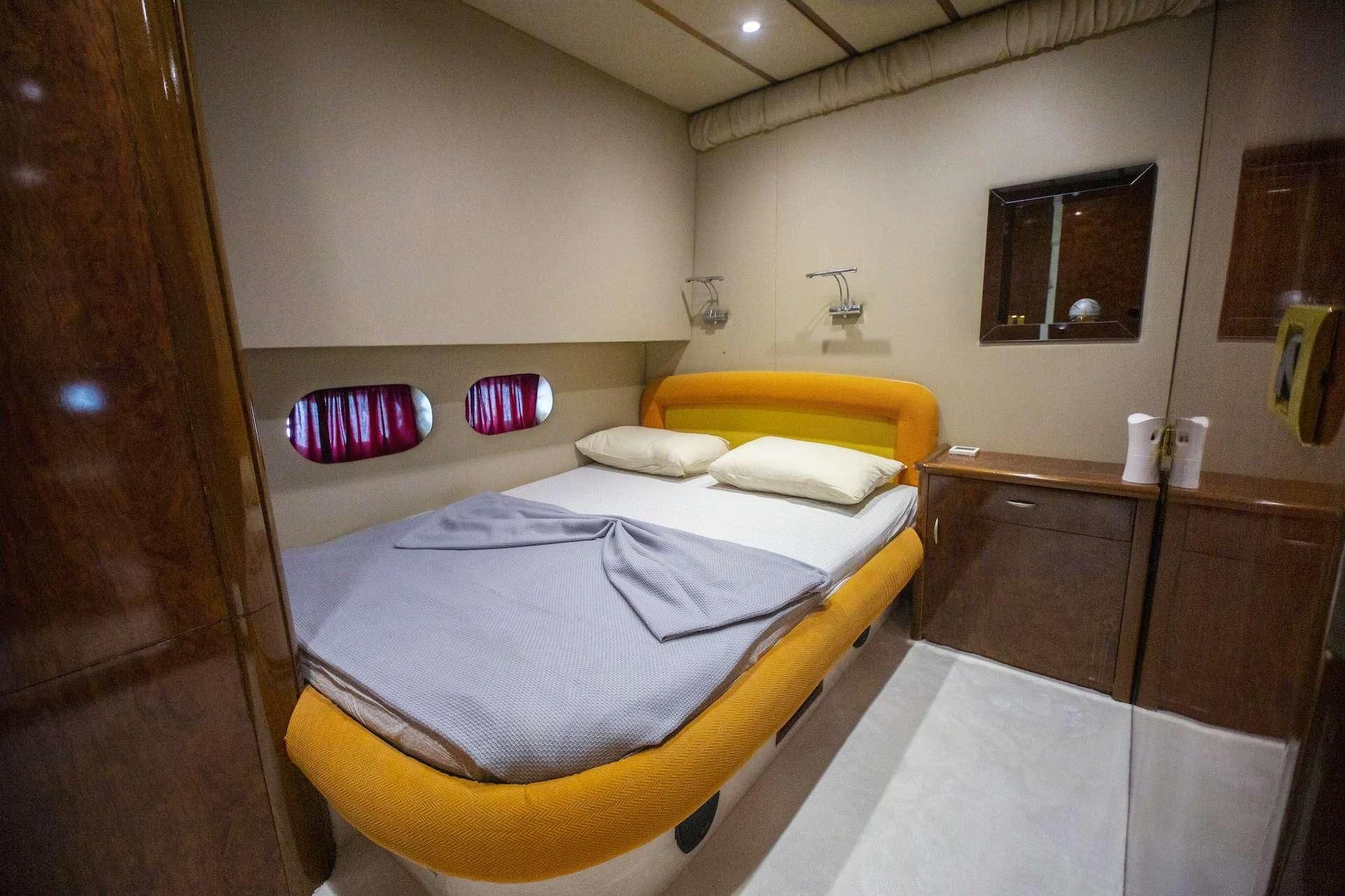 a room with two beds aboard ERDOGAN Yacht for Sale