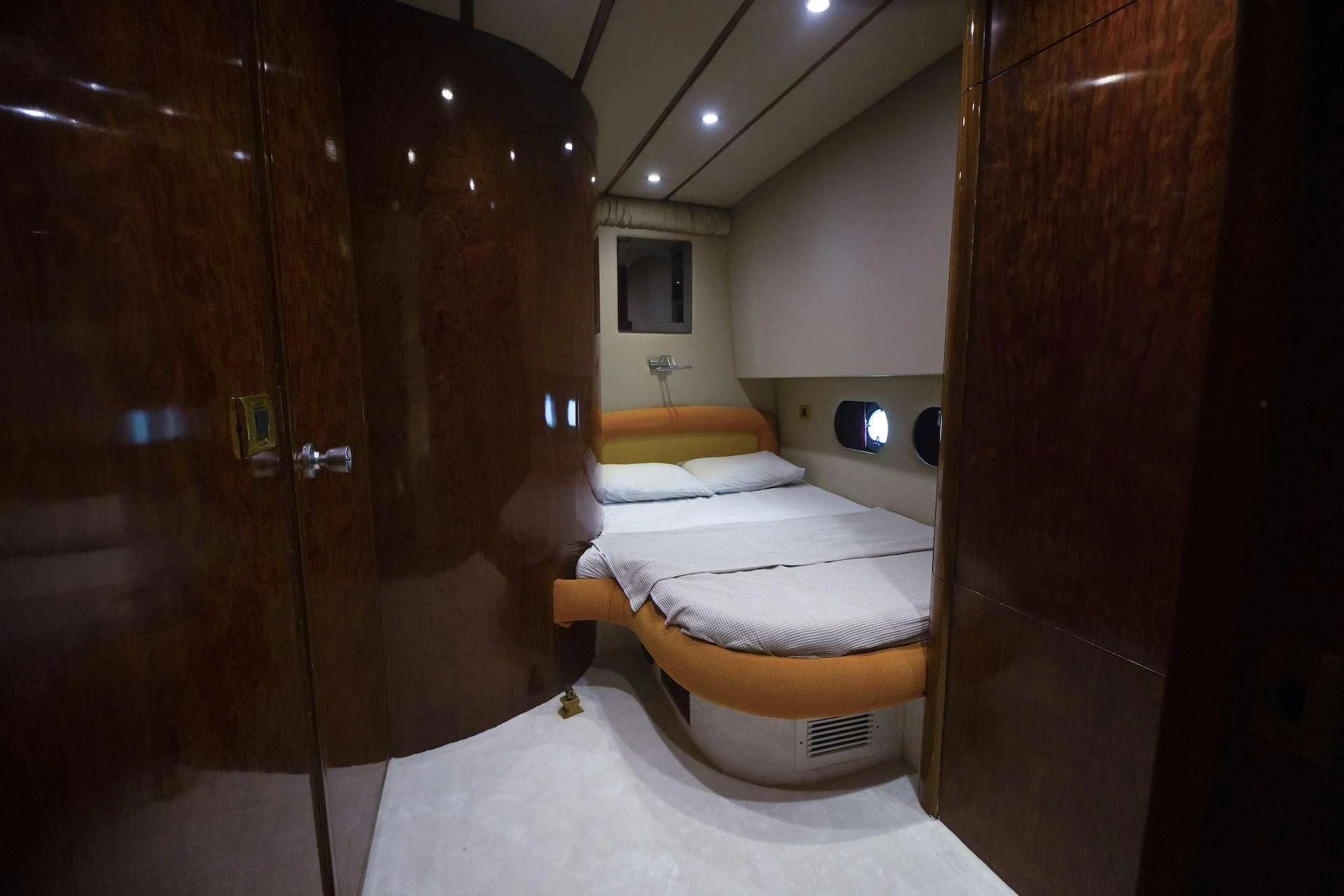 a bathroom with a toilet and a wooden door aboard ERDOGAN Yacht for Sale