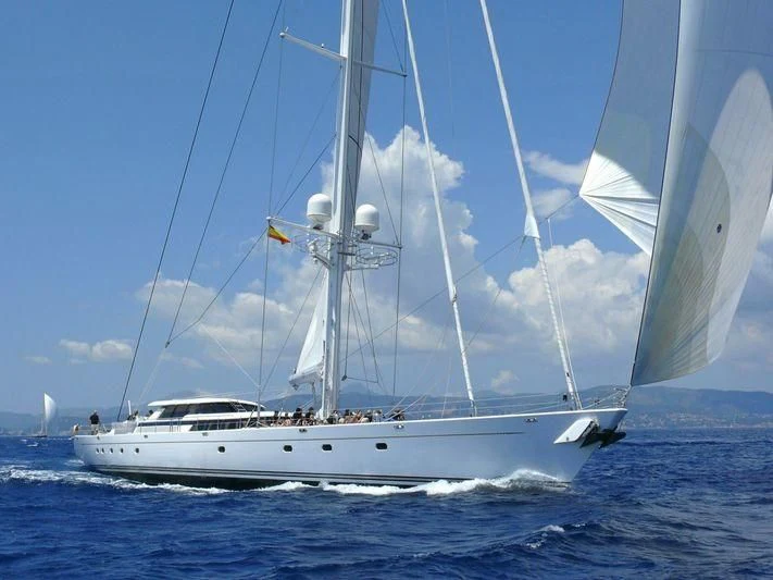 a boat sailing on the sea aboard HYPERION Yacht for Charter
