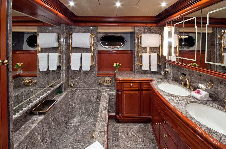 a bathroom with a marble countertop aboard HYPERION Yacht for Charter