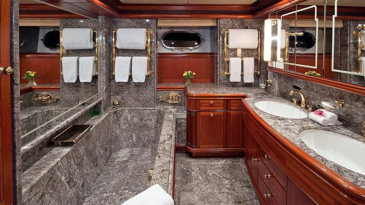 a bathroom with a marble countertop aboard HYPERION Yacht for Charter