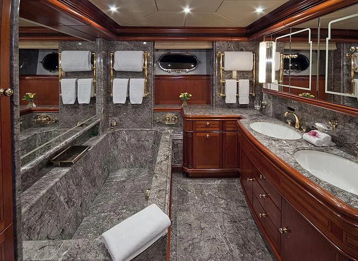 a bathroom with a marble floor aboard HYPERION Yacht for Charter