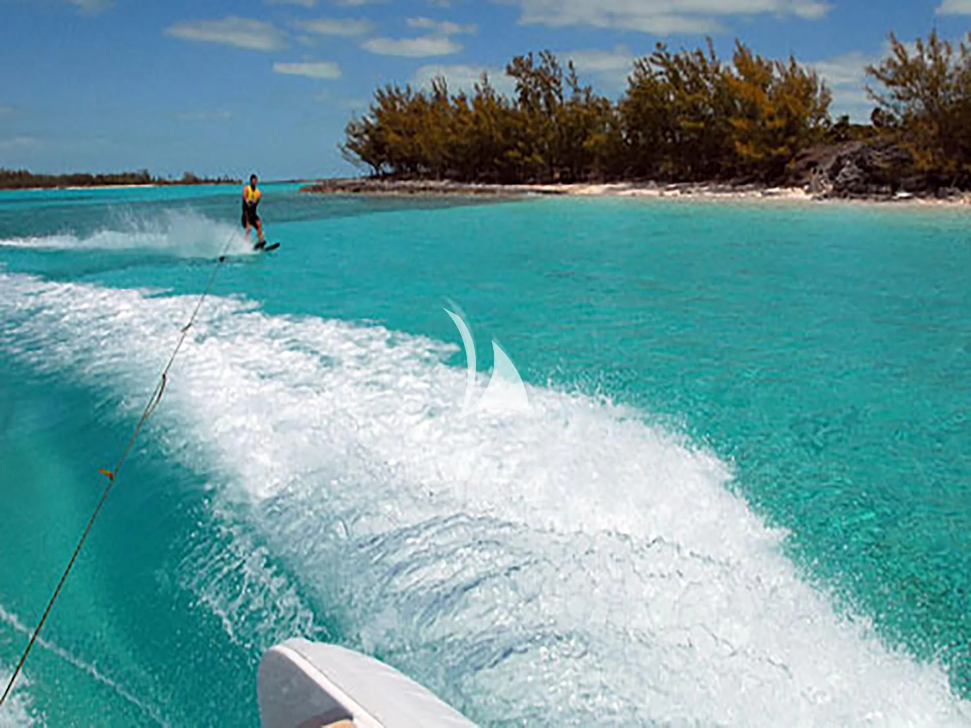 a person water skiing aboard HYPERION Yacht for Charter