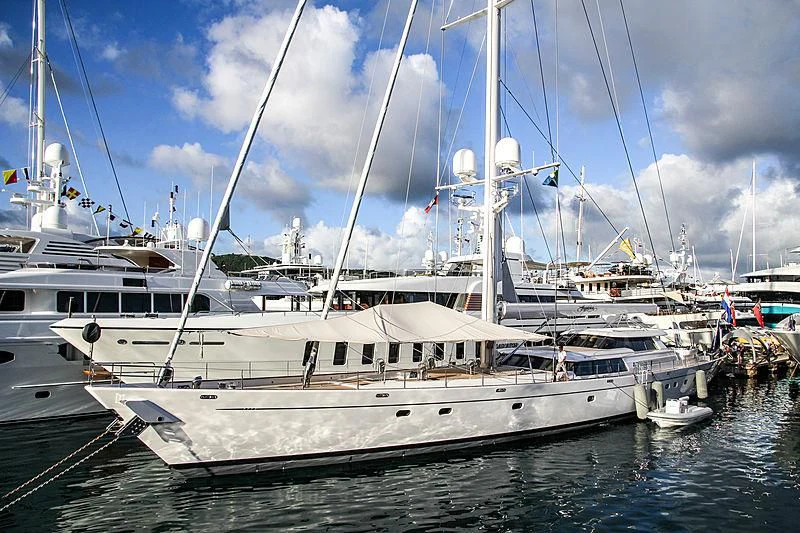 a boat docked at a pier aboard HYPERION Yacht for Charter