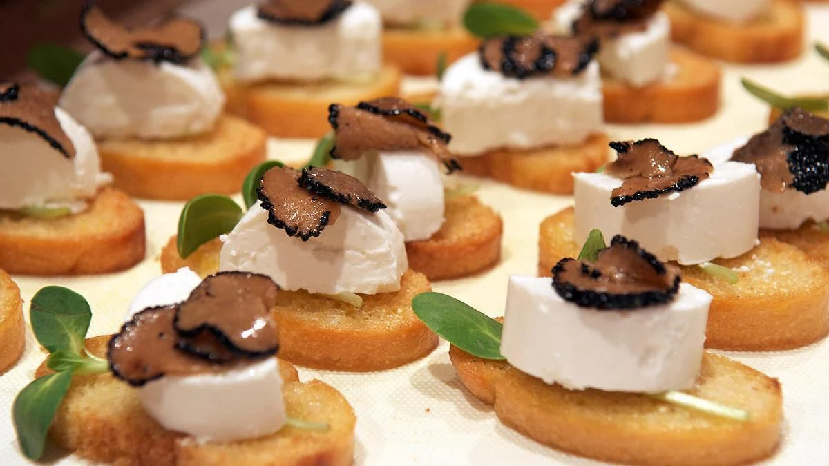 a plate of desserts aboard HYPERION Yacht for Charter