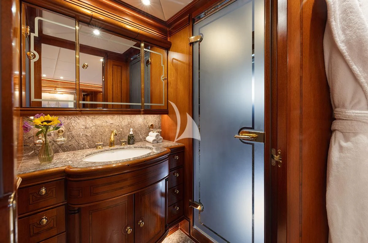 a bathroom with a sink and a mirror aboard HYPERION Yacht for Charter