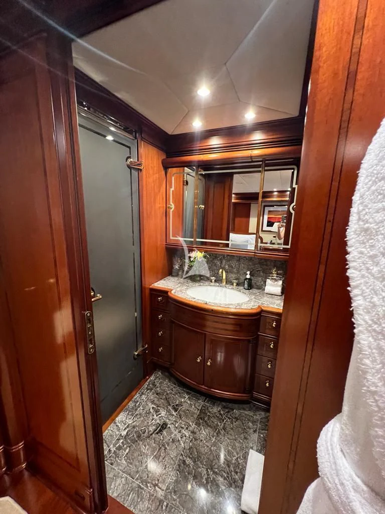 a bathroom with a sink and a mirror aboard HYPERION Yacht for Charter