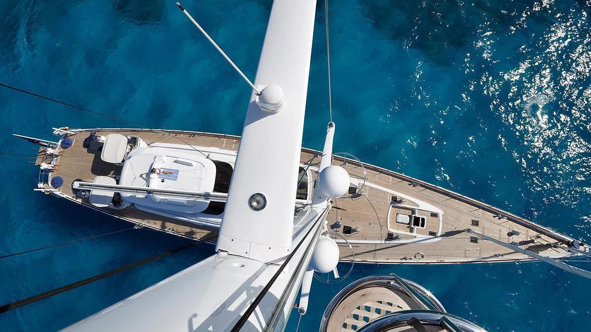 a large white ship in the water aboard HYPERION Yacht for Charter
