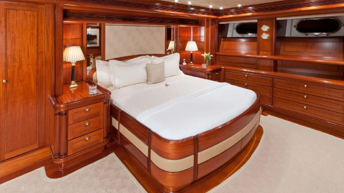 a bed in a room aboard HYPERION Yacht for Charter