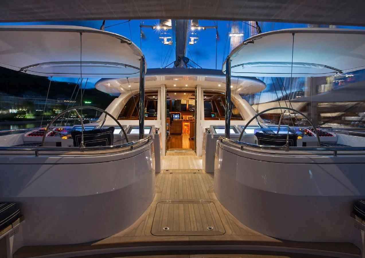 a boat dock with a boat aboard HYPERION Yacht for Charter