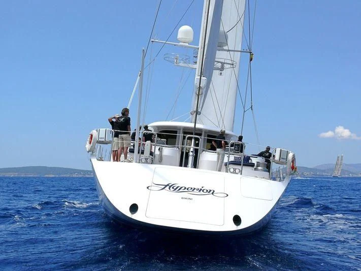 a white boat in the water aboard HYPERION Yacht for Charter