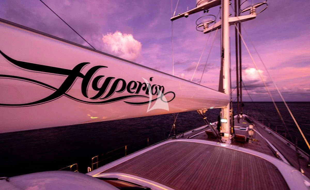 a large ship on a body of water aboard HYPERION Yacht for Charter