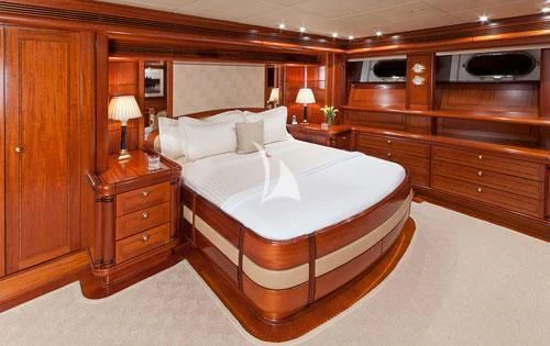 a large bed in a room aboard HYPERION Yacht for Charter