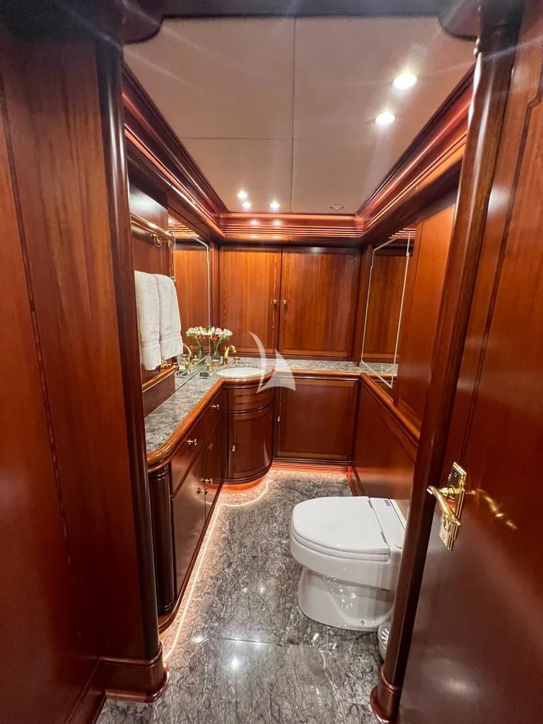 a bathroom with wooden walls aboard HYPERION Yacht for Charter