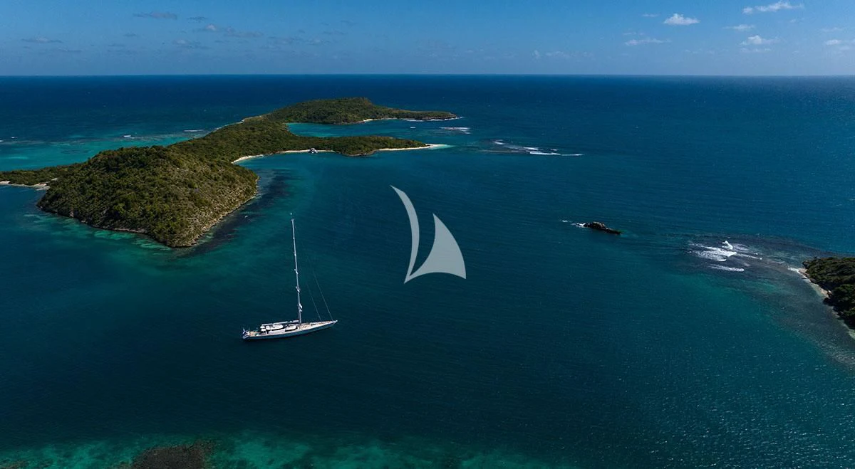 a boat sailing in the ocean aboard HYPERION Yacht for Charter