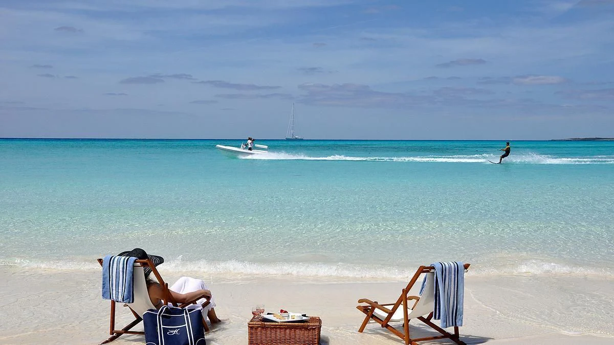 people on a beach aboard HYPERION Yacht for Charter