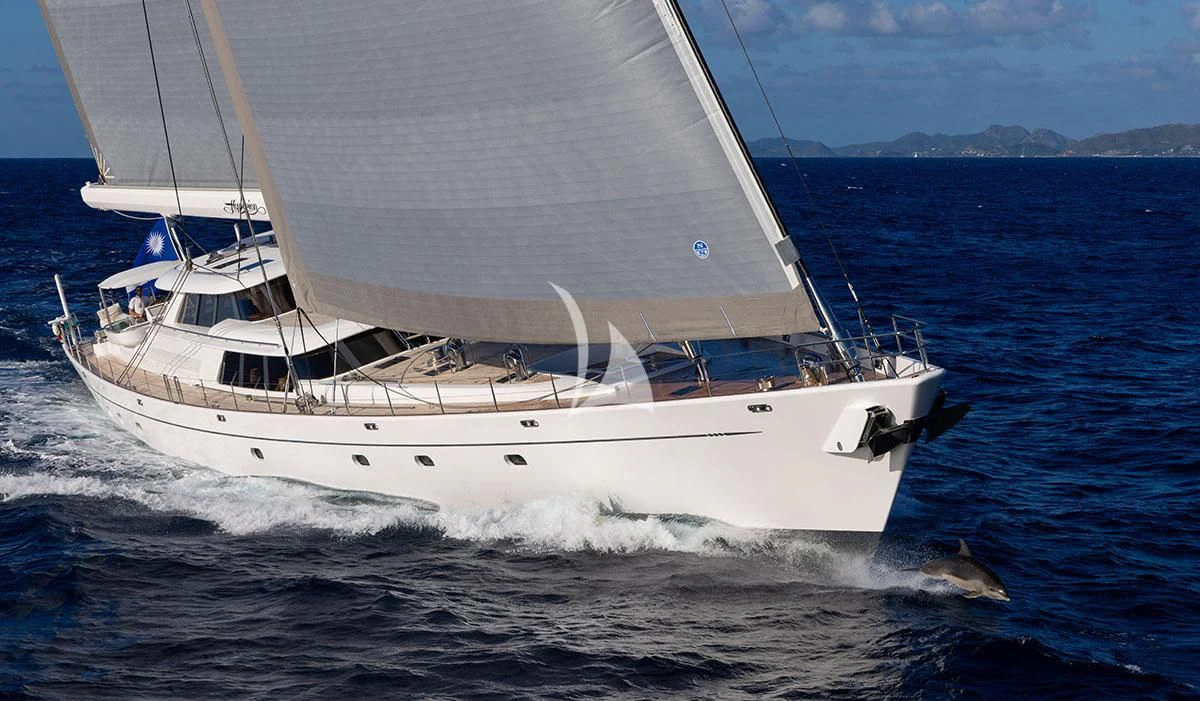 a white boat on the water aboard HYPERION Yacht for Charter