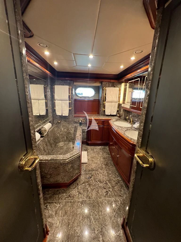 a bathroom with a large mirror aboard HYPERION Yacht for Charter