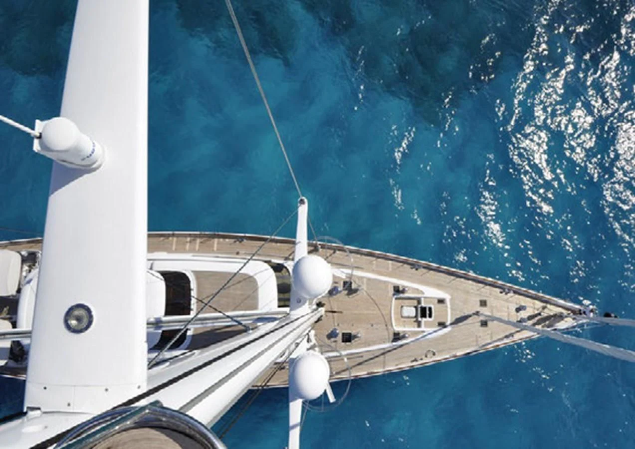 a white boat in the water aboard HYPERION Yacht for Charter