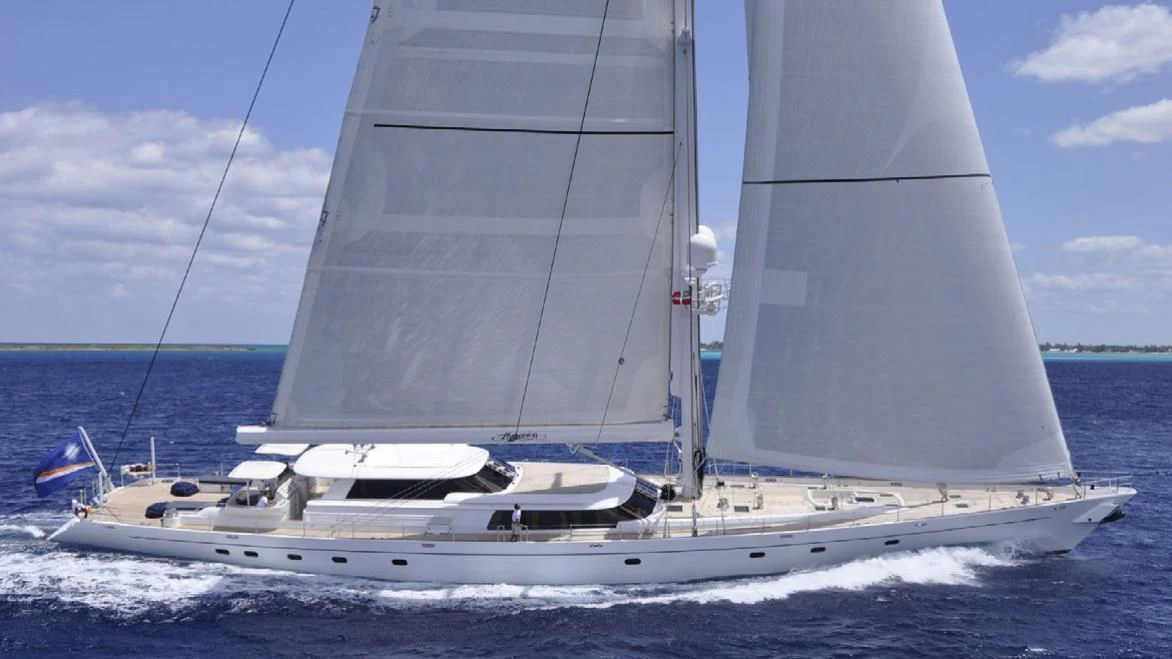 a white sailboat on the water aboard HYPERION Yacht for Charter