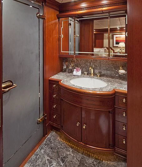 a bathroom with a sink and a mirror aboard HYPERION Yacht for Charter