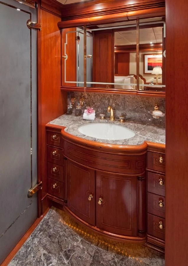 a bathroom with a large mirror aboard HYPERION Yacht for Charter