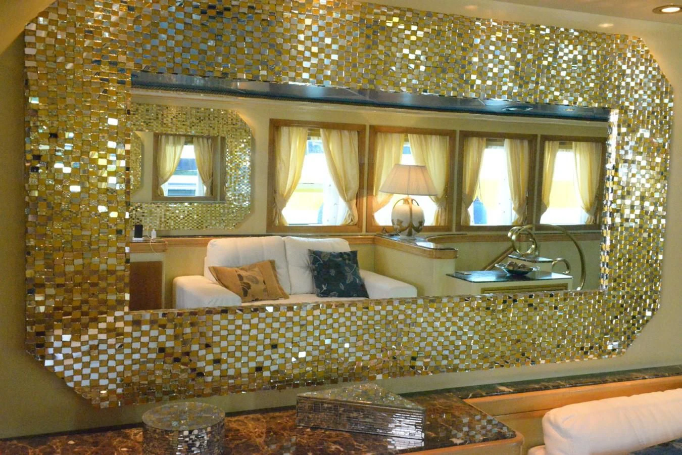 a large bed with a chandelier aboard MISTER P Yacht for Sale