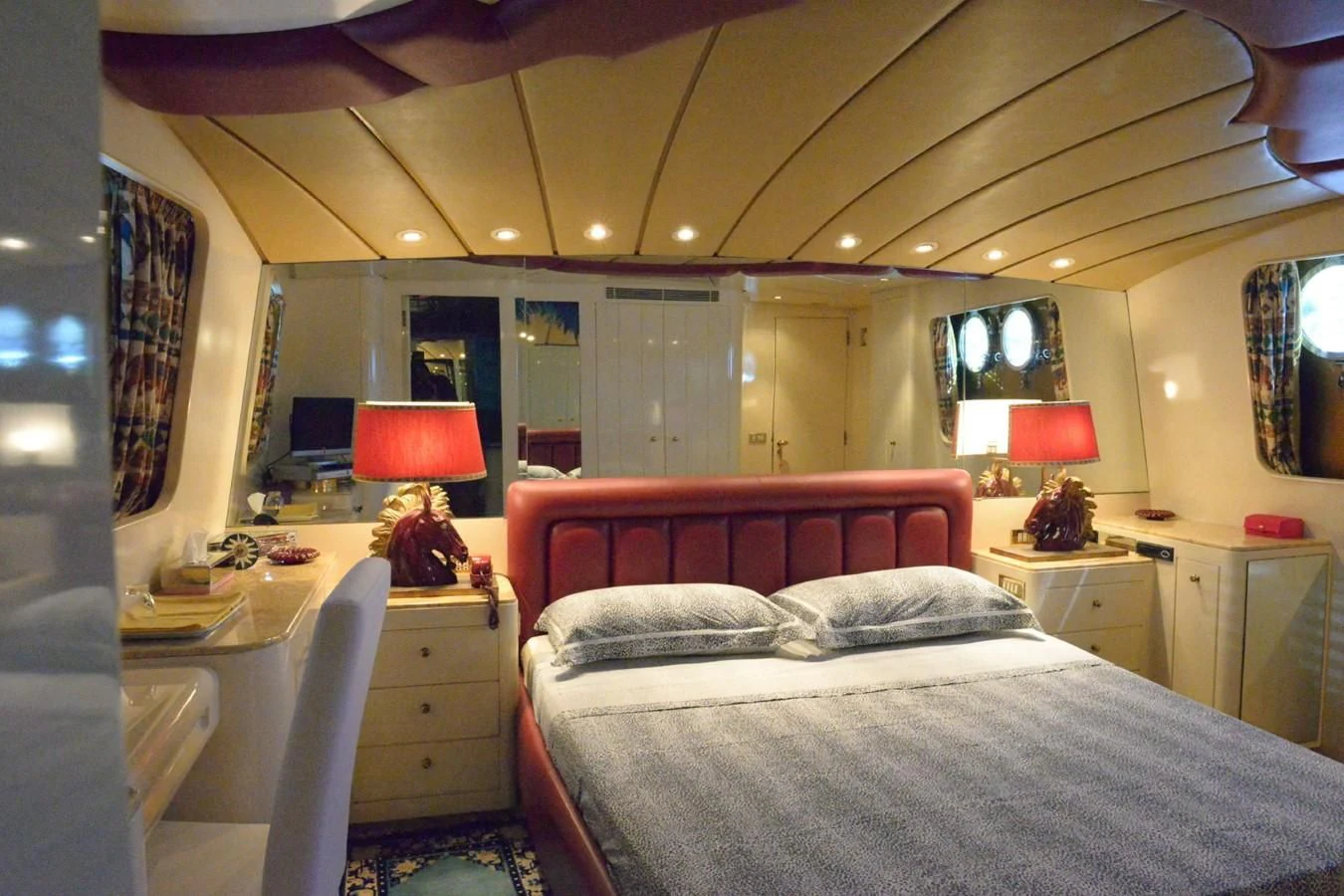 a bedroom with two beds aboard MISTER P Yacht for Sale