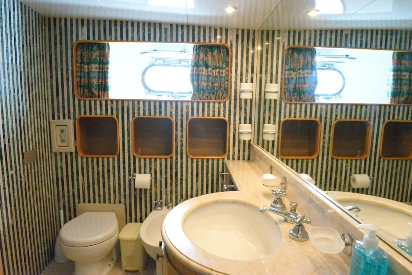 a bathroom with a sink and toilet aboard MISTER P Yacht for Sale
