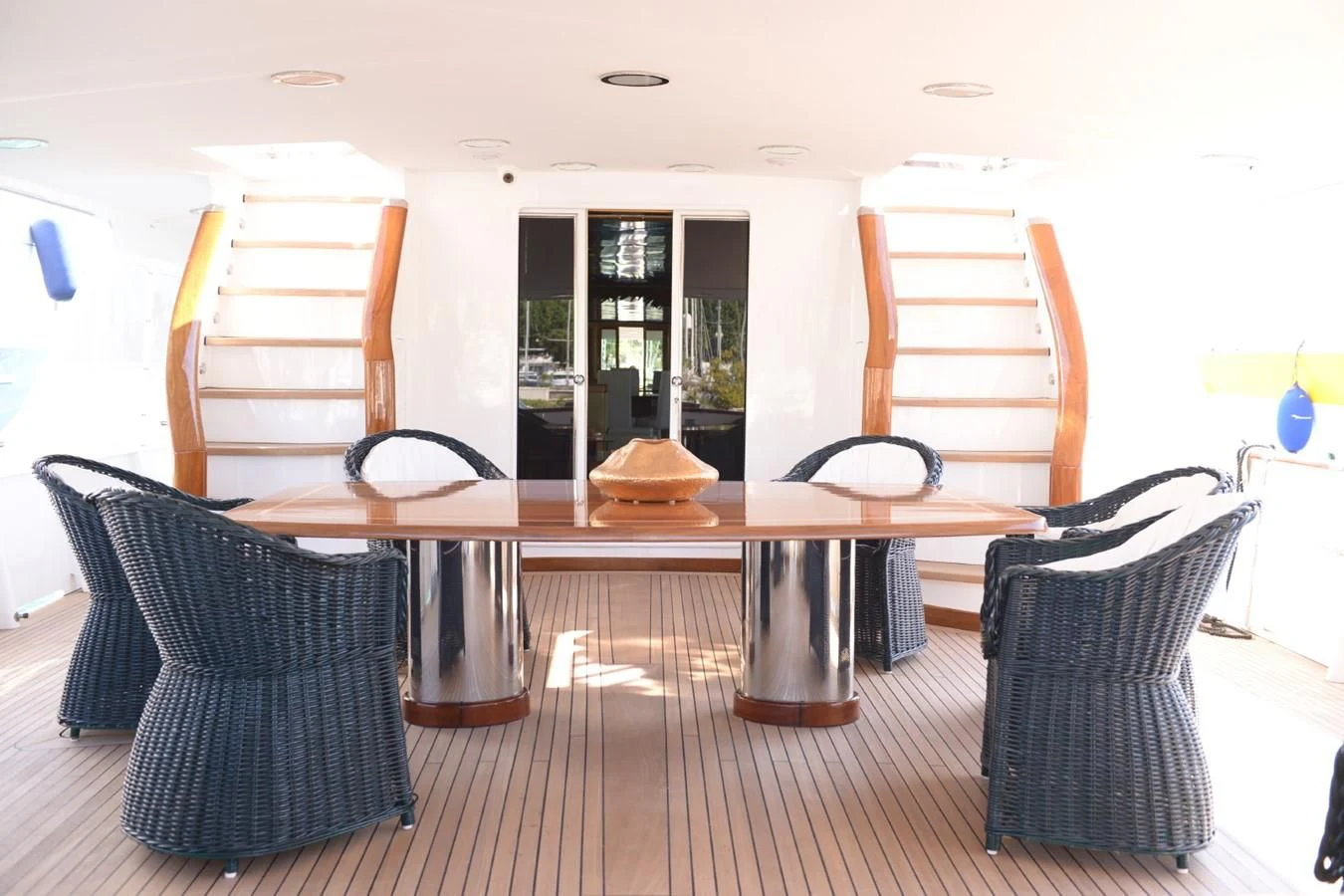 a table and chairs in a room aboard MISTER P Yacht for Sale