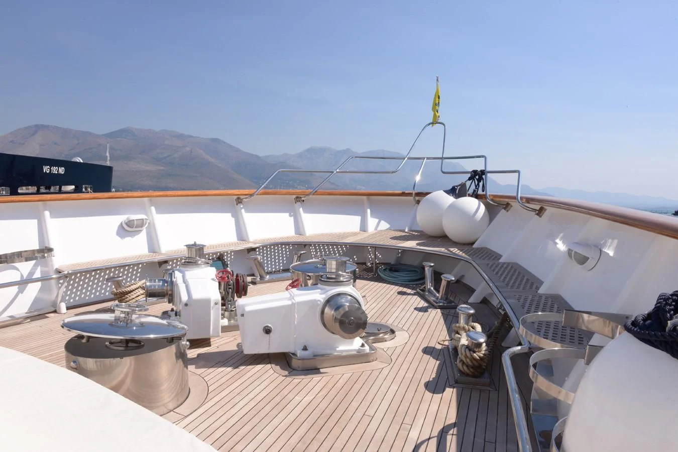 a deck with a large ship on it and a large ship in the water aboard MISTER P Yacht for Sale