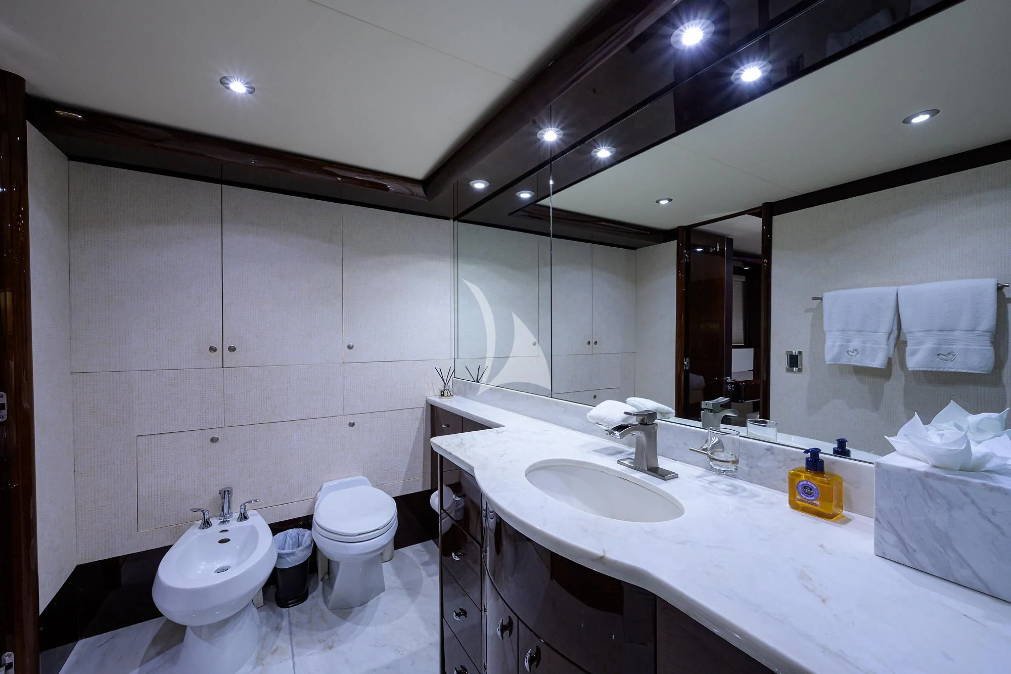 a bathroom with a large mirror aboard THE JOB FATHER Yacht for Sale