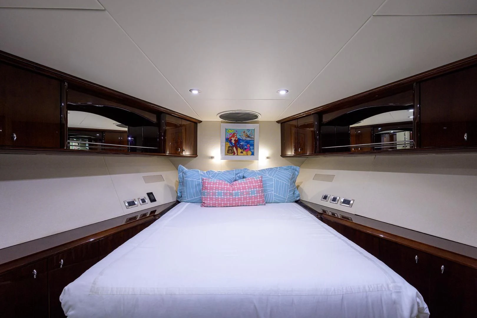 a bedroom with a bed and a television aboard THE JOB FATHER Yacht for Sale