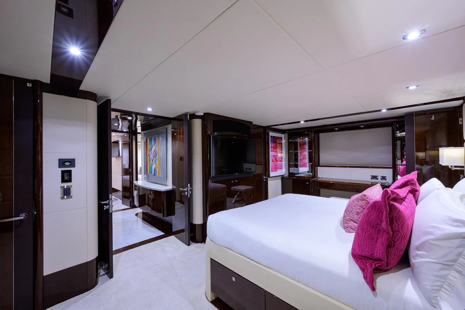 a room with a bed and a television aboard THE JOB FATHER Yacht for Sale