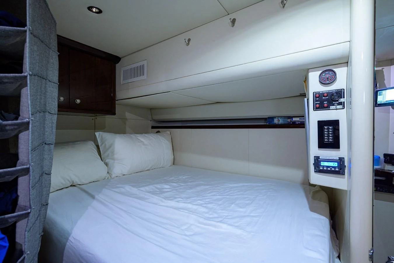 a bed with a white sheet aboard THE JOB FATHER Yacht for Sale